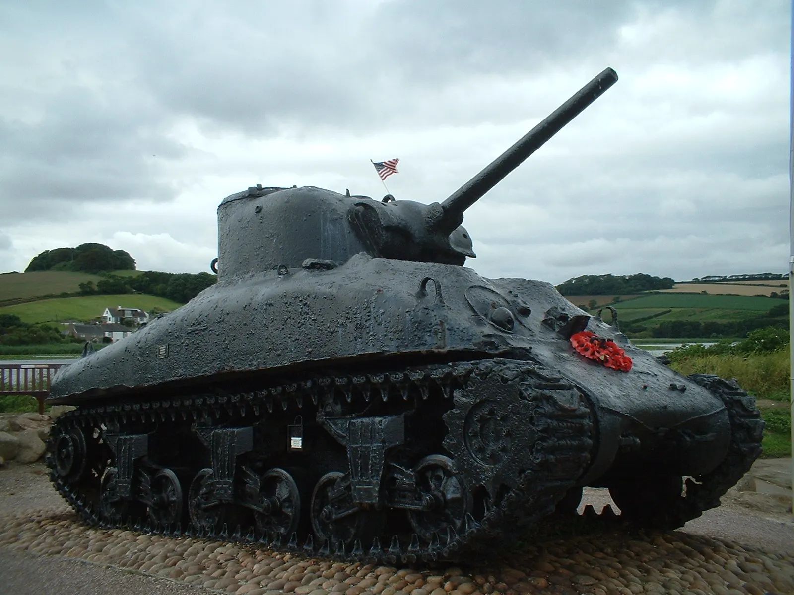 A photograaph of the aformentioned tank from before. The tank has a large flower up on its front chasis, and the water damage is clearly visible by the hull's color and texture.