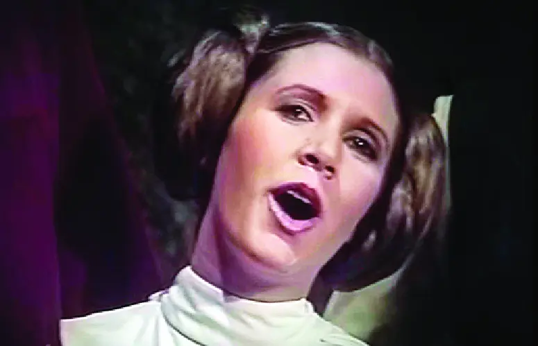 Princess Leia in the Holiday Special singing.