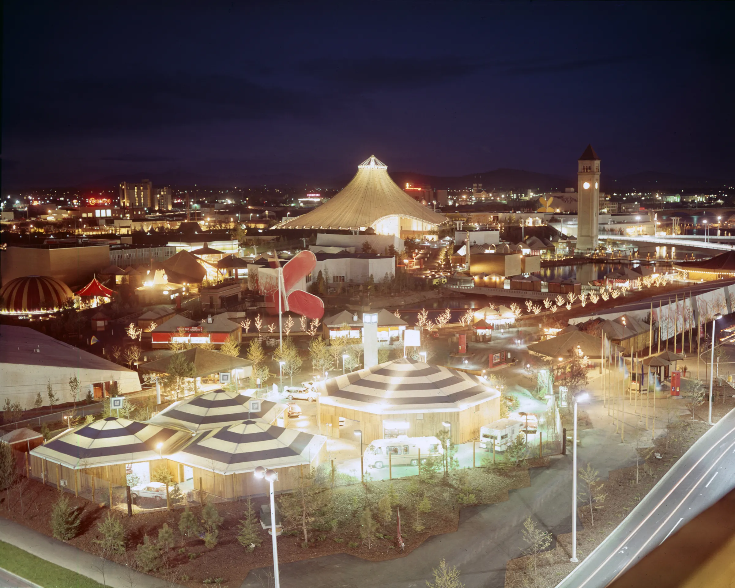 A photo taken during Expo '74 showing the pavillion at night, all lit up.