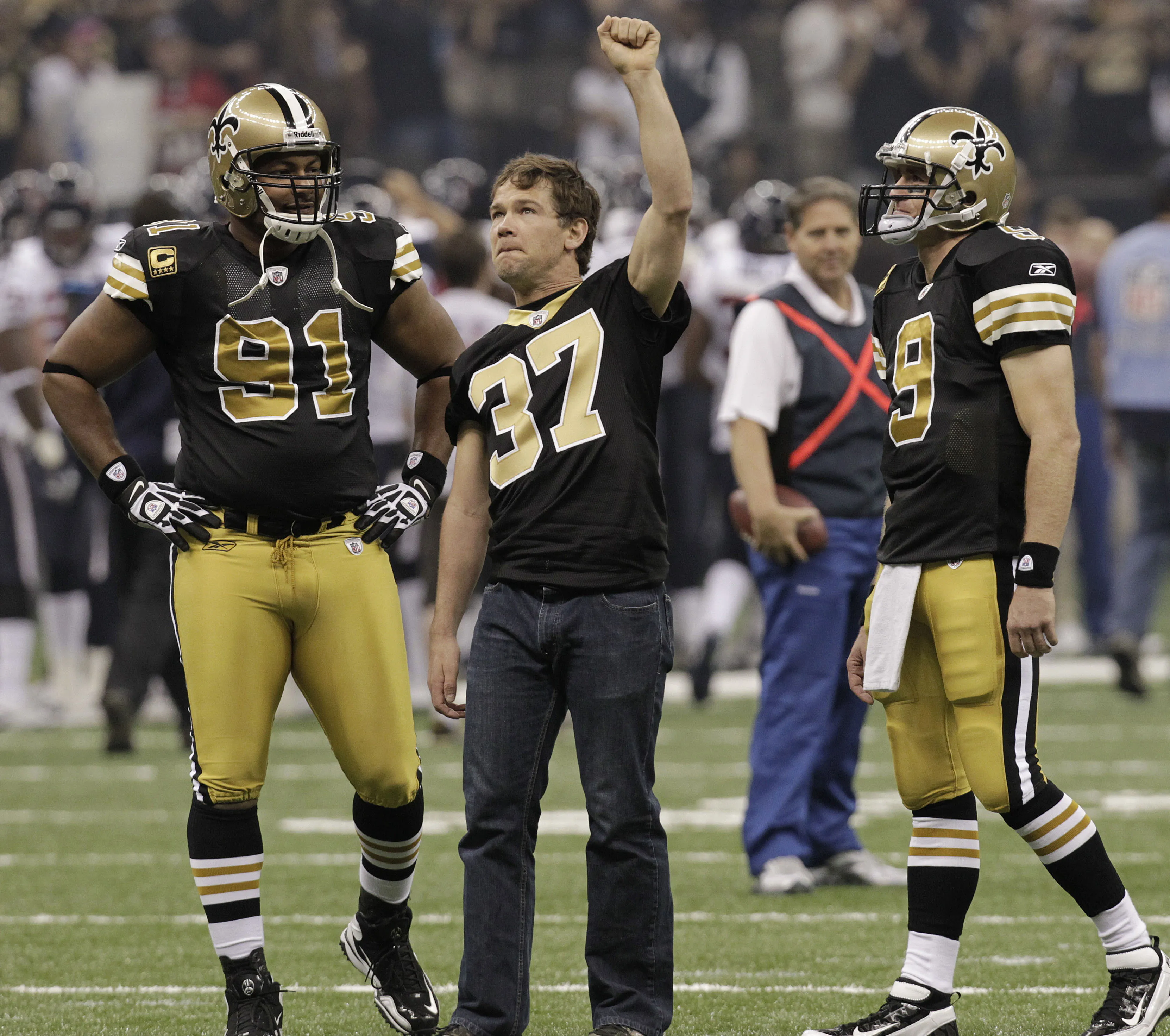 A photo from Gleason's instagram feed of him holding his hand up in the air.