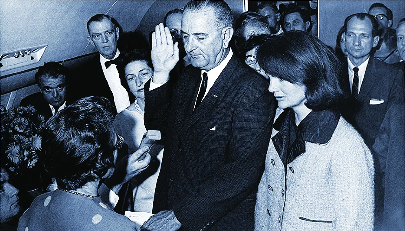 LBJ being sworn in as the new president.